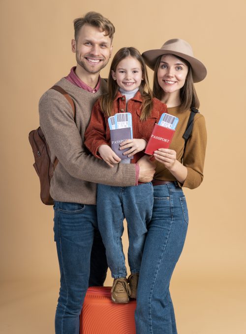 family-three-ready-traveling-with-passport-plane-tickets